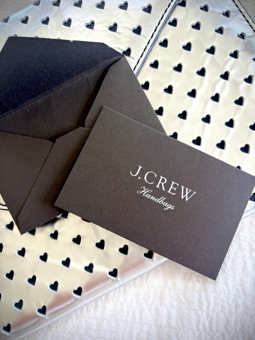 J. Crew Silver Leather Envelope Clutch with Cutout Hearts - Picture 8 of 14